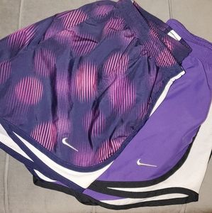 2 pairs of Medium Nike running shorts